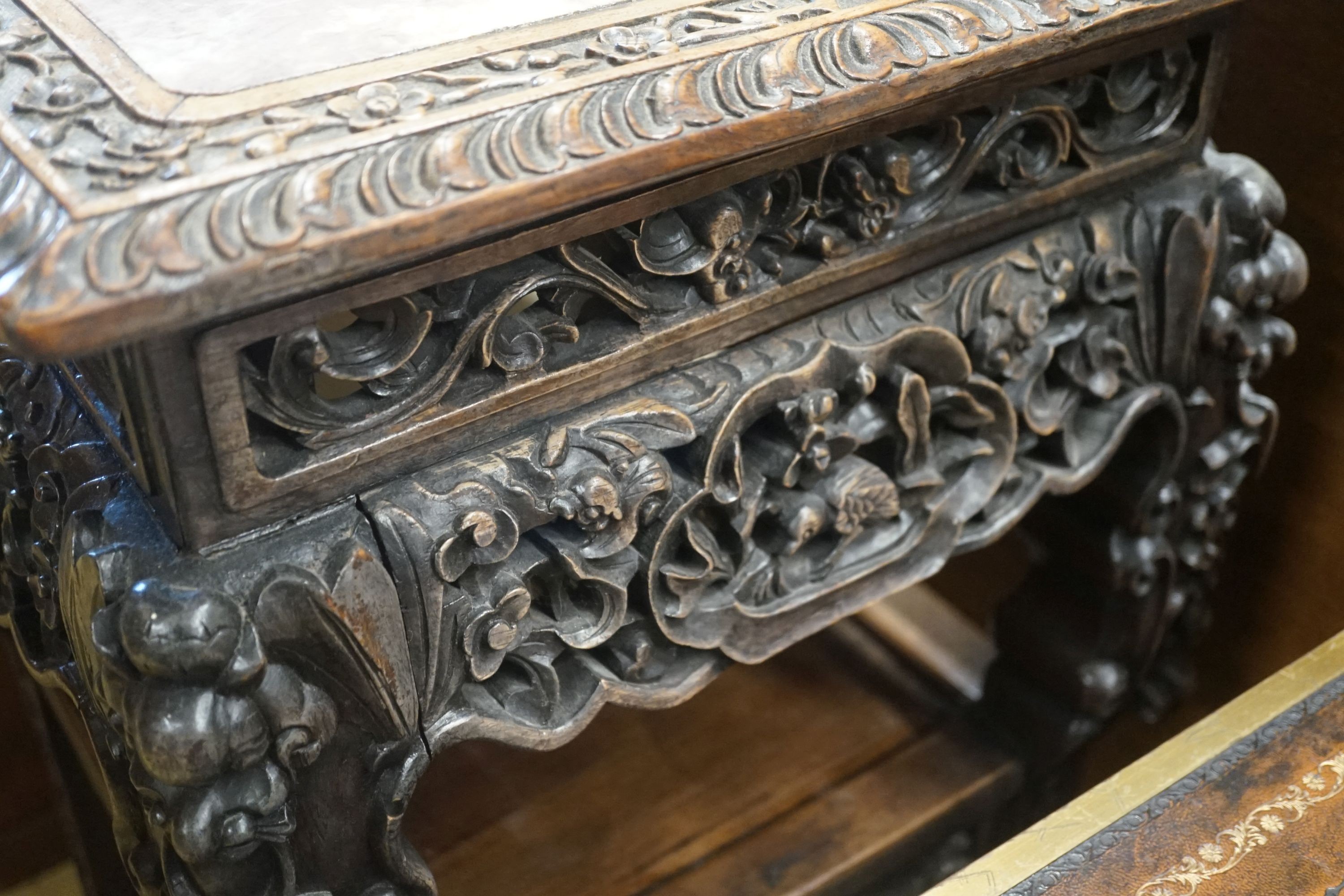 A Chinese carved hardwood two tier jardiniere stand with rouge marble top, width 43cm, depth 43cm, height 80cm